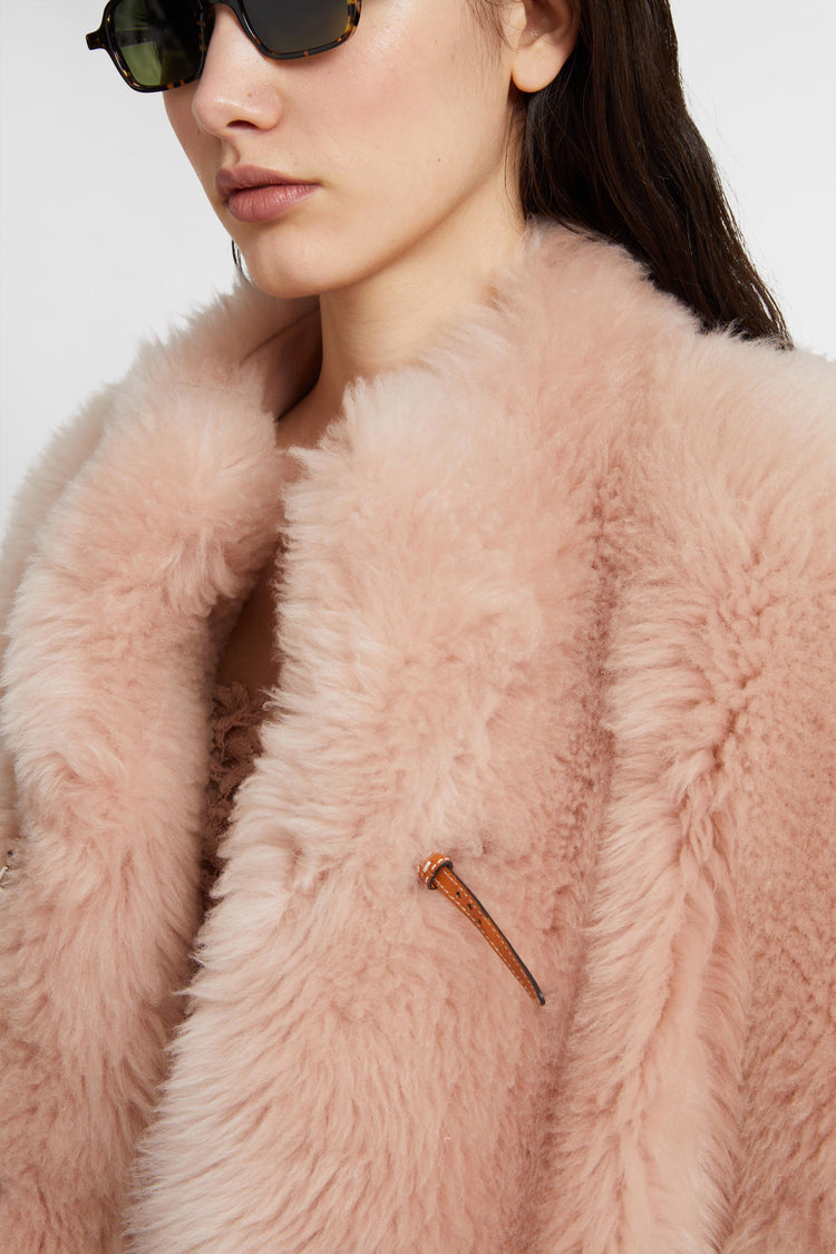 Lambskin leather over jacket with leather and gold metal details.
