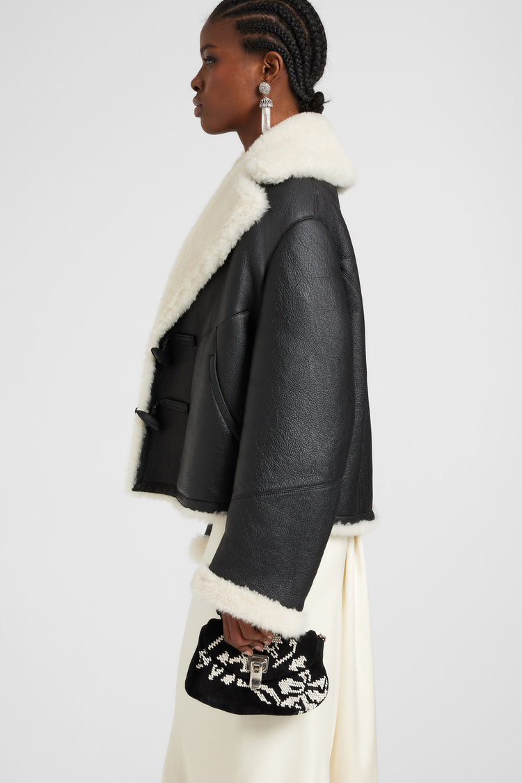 Oversize shearling jacket with contrast details