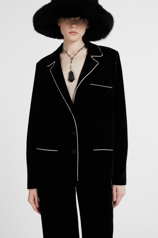 Blusa in velluto con piping a contrasto