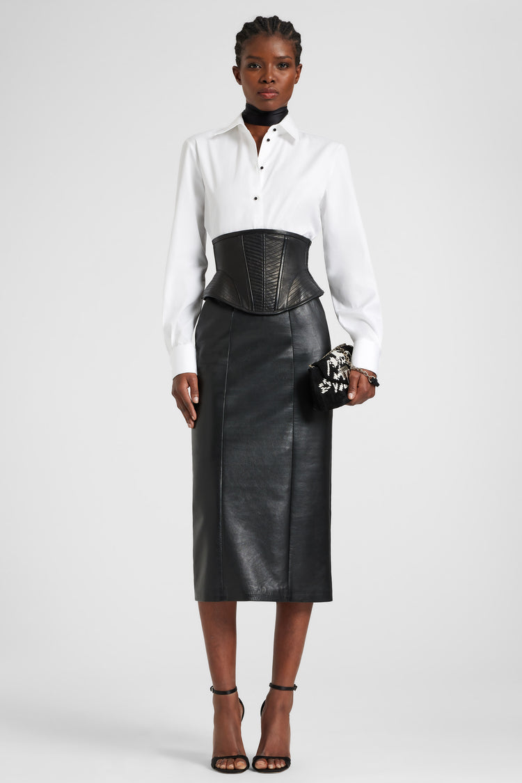 Leather corset with braided straps and sculptural hip structure