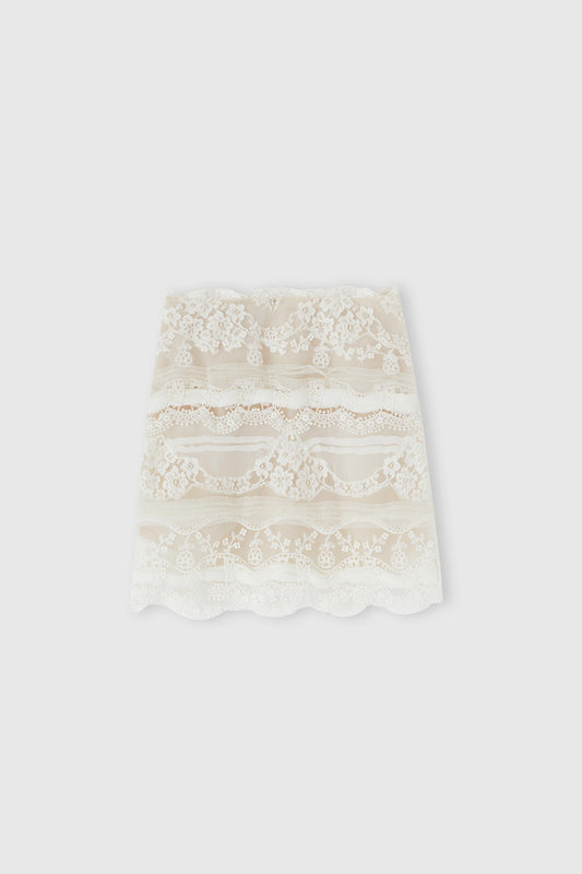 Miniskirt in patchwork of lace and georgette