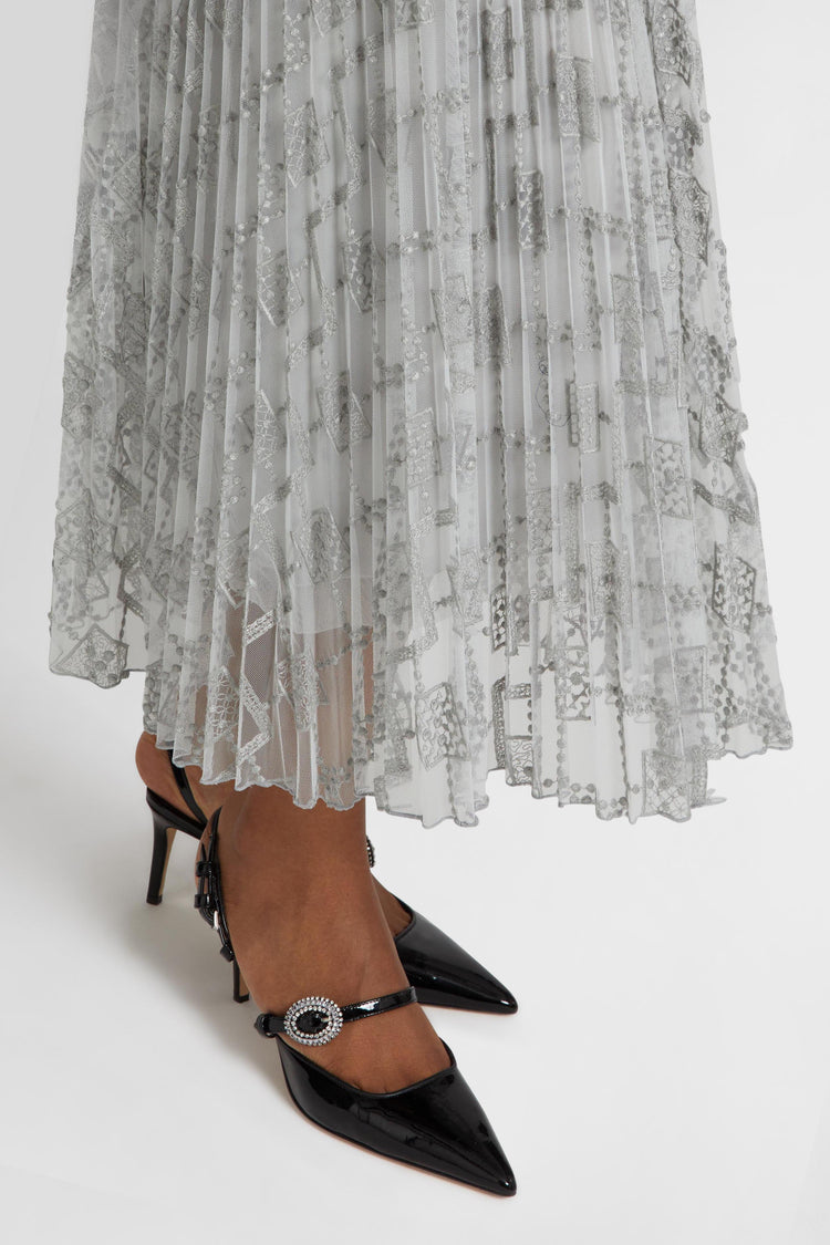 Pleated midi skirt with embroidered argyle motif