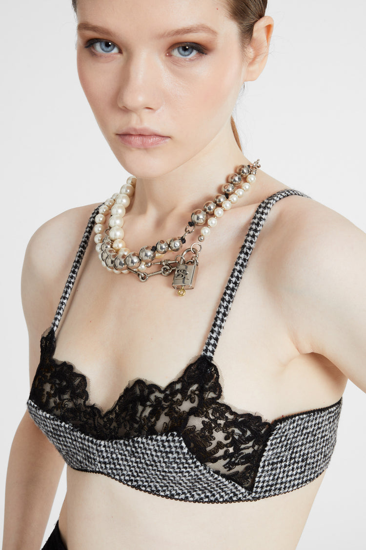 Multi-strand necklace with mix of pearls, glass, and hand-hammered metal beads - silver tone