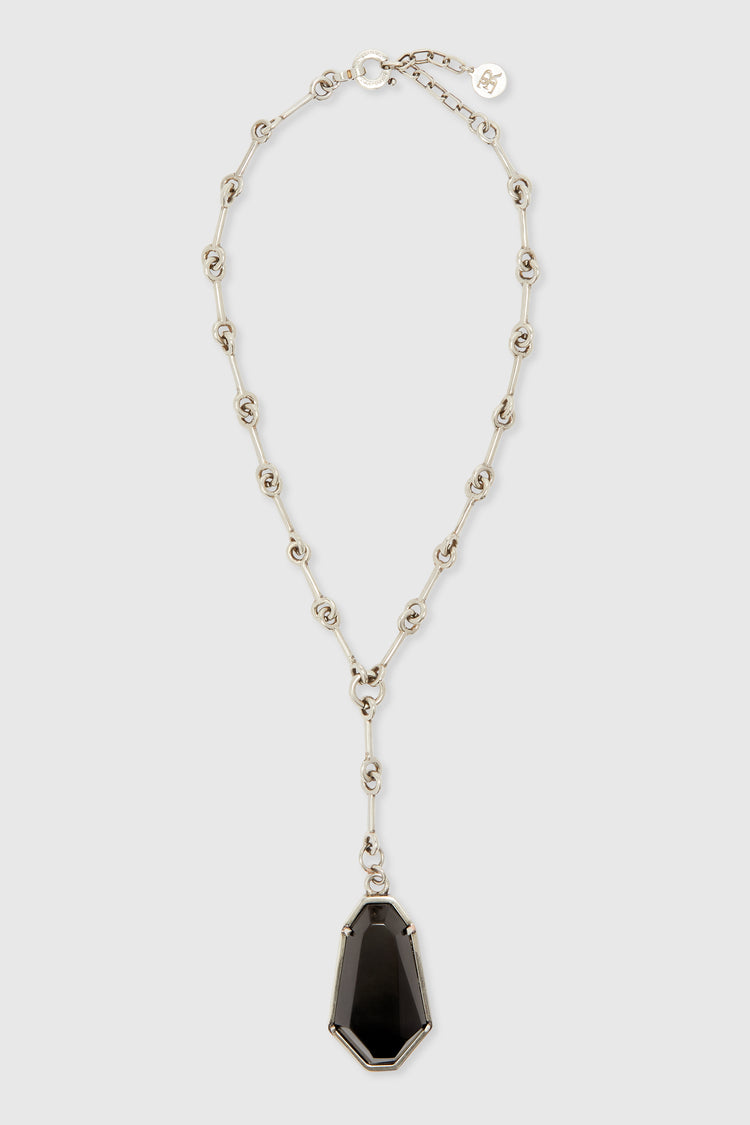 Necklace with pendant setting and irregular faceted stones