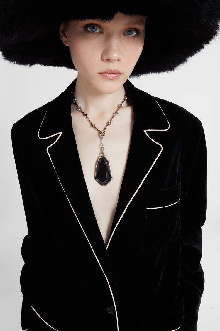 Necklace with pendant setting and irregular faceted stones