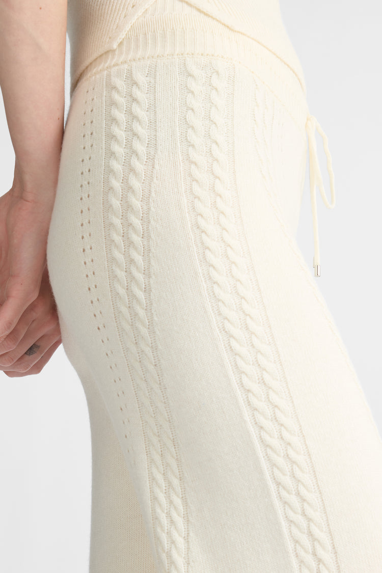 Cropped trousers in wool and cashmere blend with cable pattern