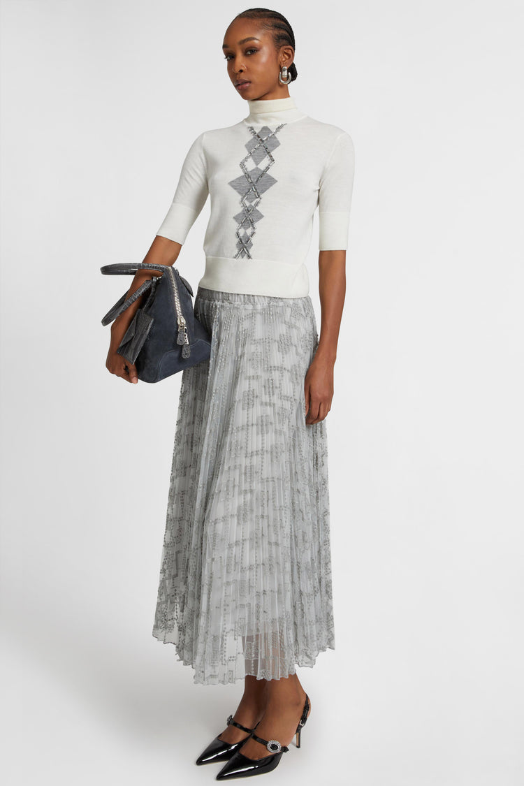 Merino wool top with argyle motif and baguette crystals