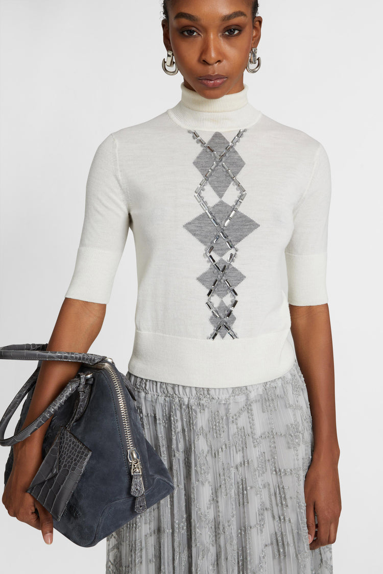 Merino wool top with argyle motif and baguette crystals