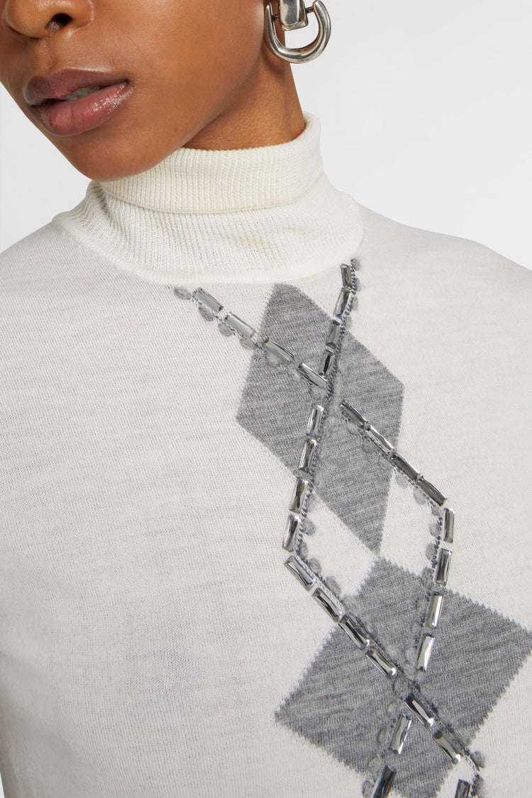 Merino wool top with argyle motif and baguette crystals