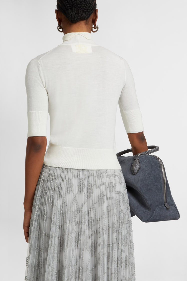 Merino wool top with argyle motif and baguette crystals