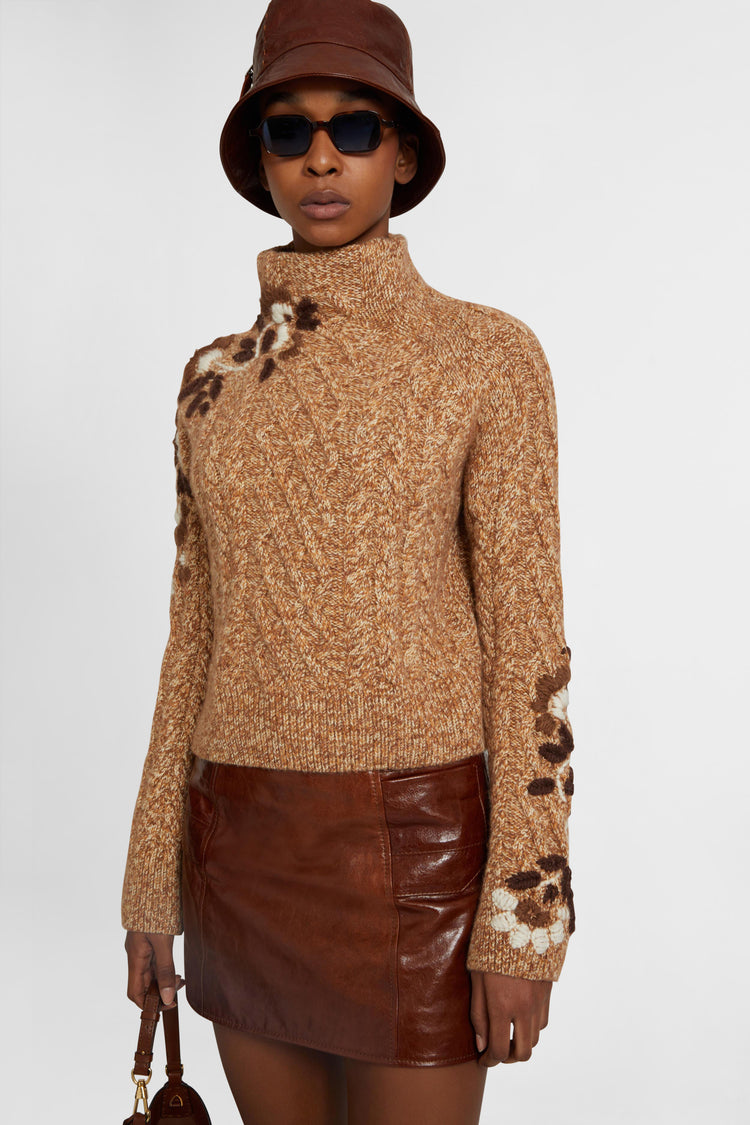 Pure cashmere sweater with braids and three-dimensional floral embroidery made by hand