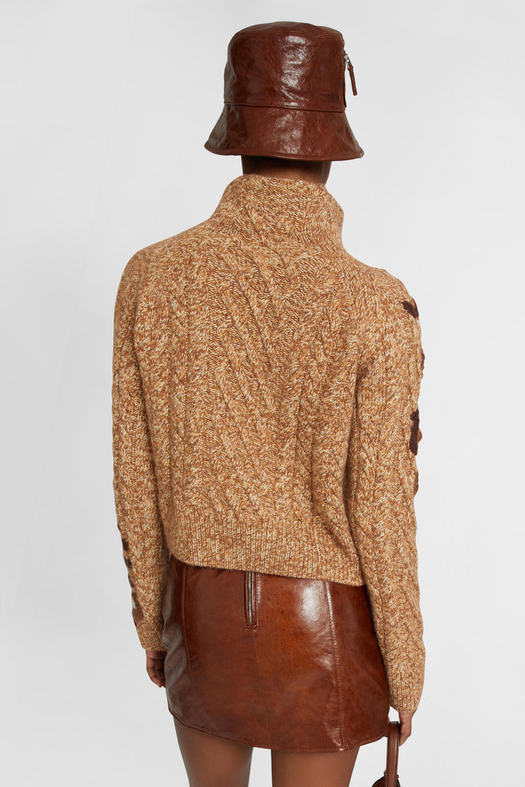 Pure cashmere sweater with braids and three-dimensional floral embroidery made by hand