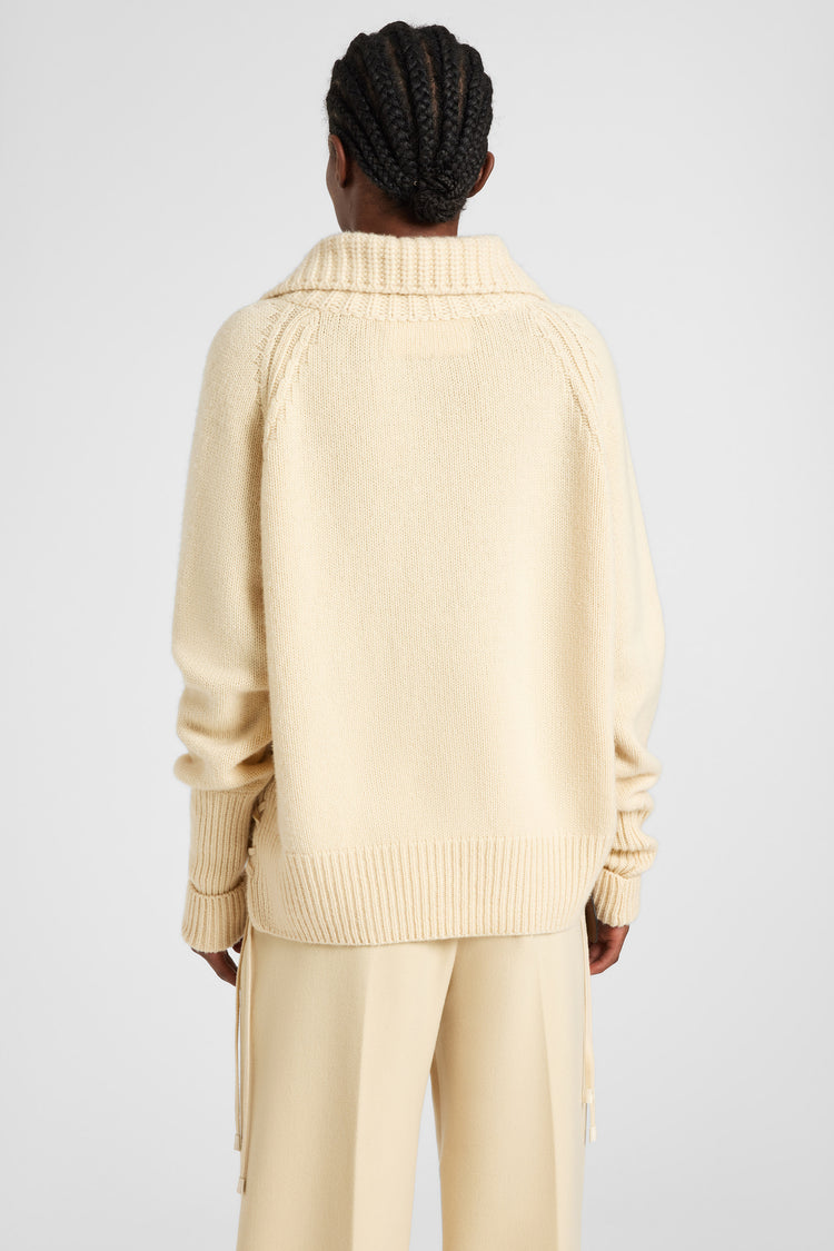 Pure cashmere sweater with handcrafted braiding