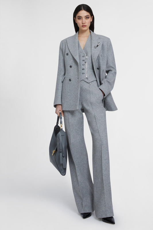 Double-breasted wool blend jacket with asymmetric zip
