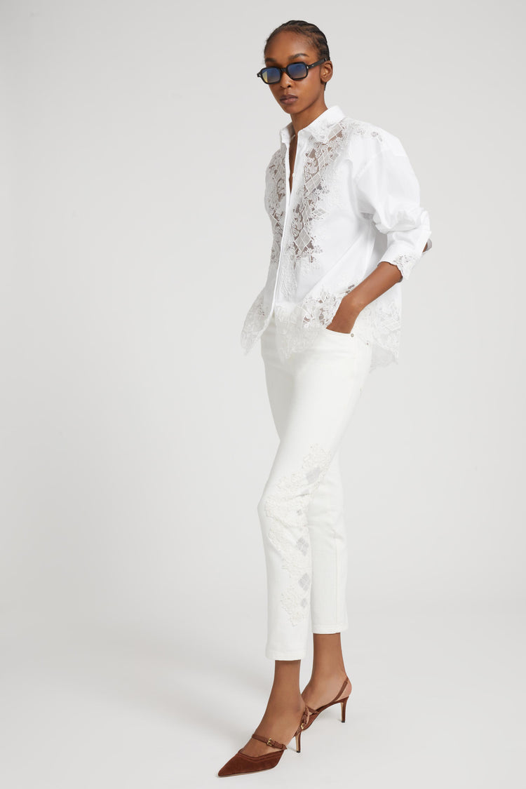 Five-pocket denim jeans with rebrode lace