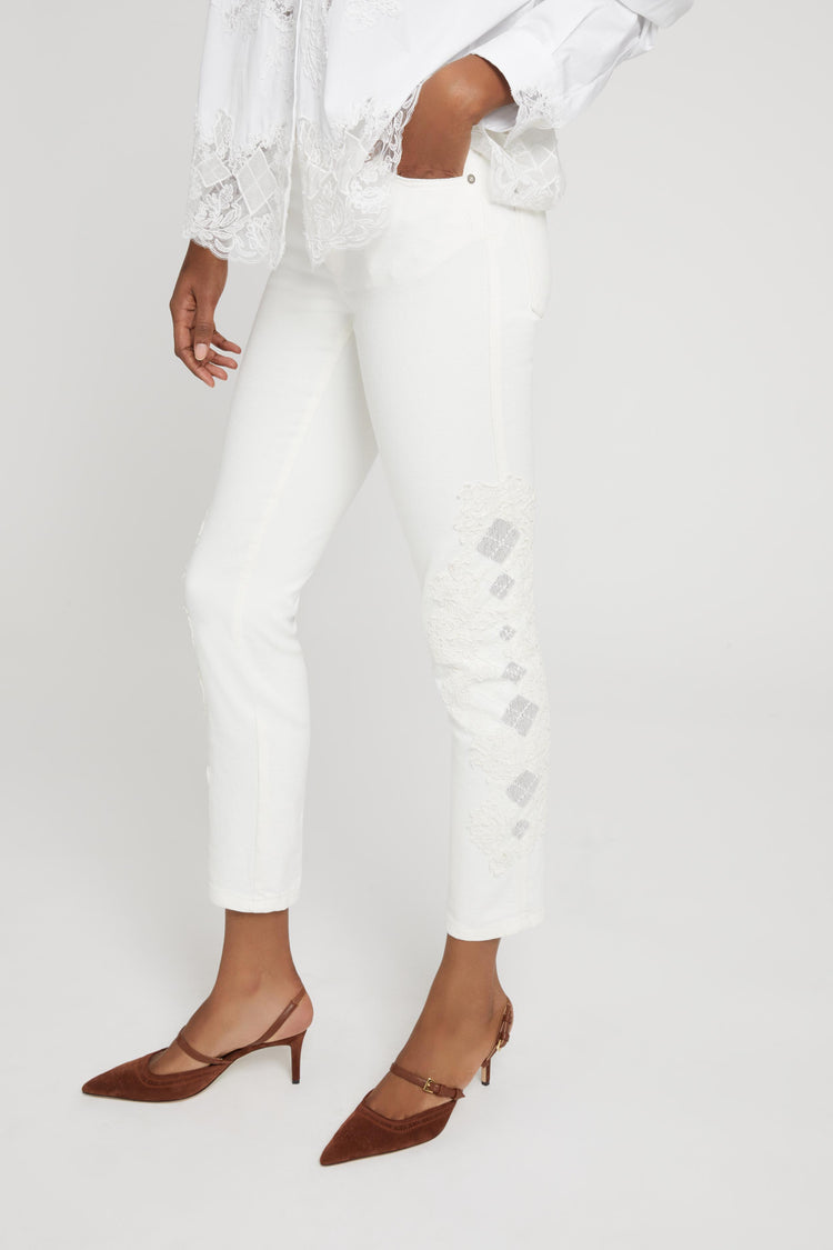 Five-pocket denim jeans with rebrode lace