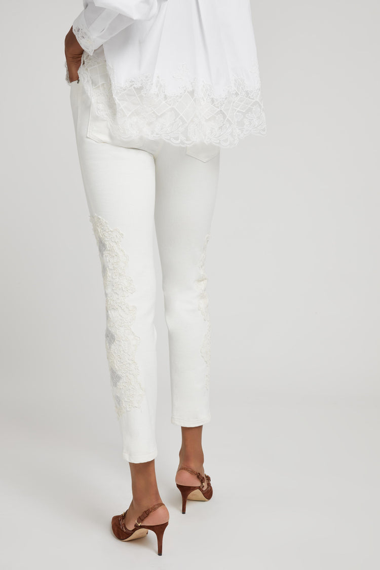 Five-pocket denim jeans with rebrode lace