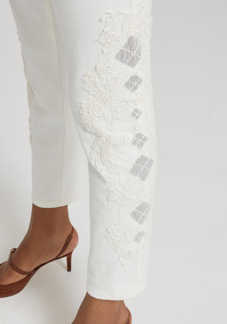 Five-pocket denim jeans with rebrode lace