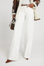 Pantalone palazzo in denim bianco con cut out floreale