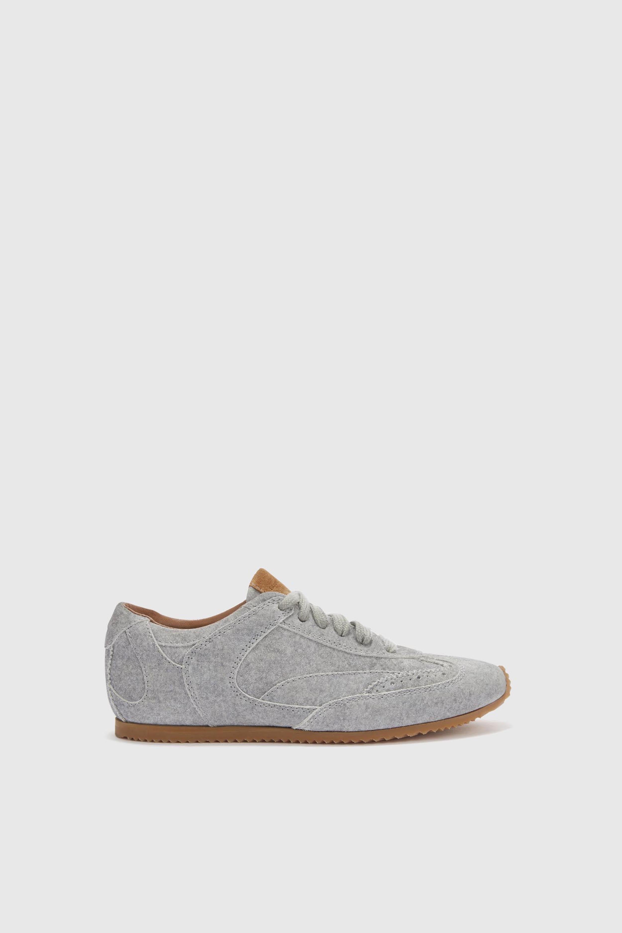 The new Winner sneaker in split leather with cloth effect
