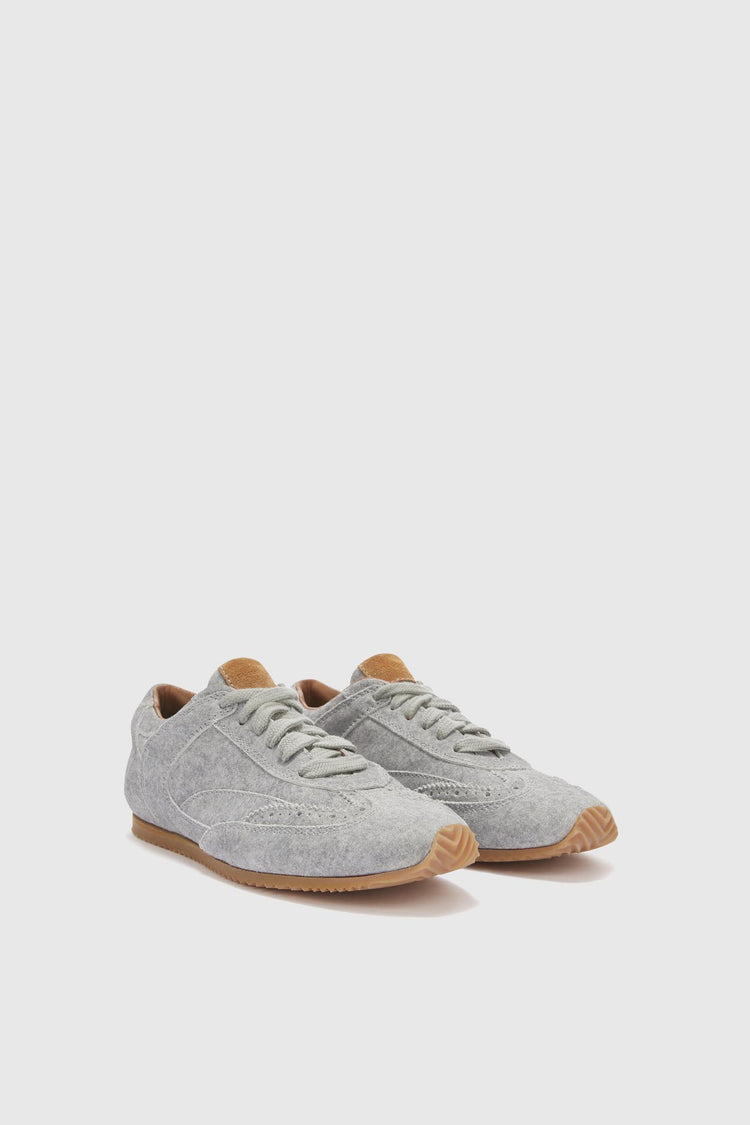 The new Winner sneaker in split leather with cloth effect print and amber rubber sole