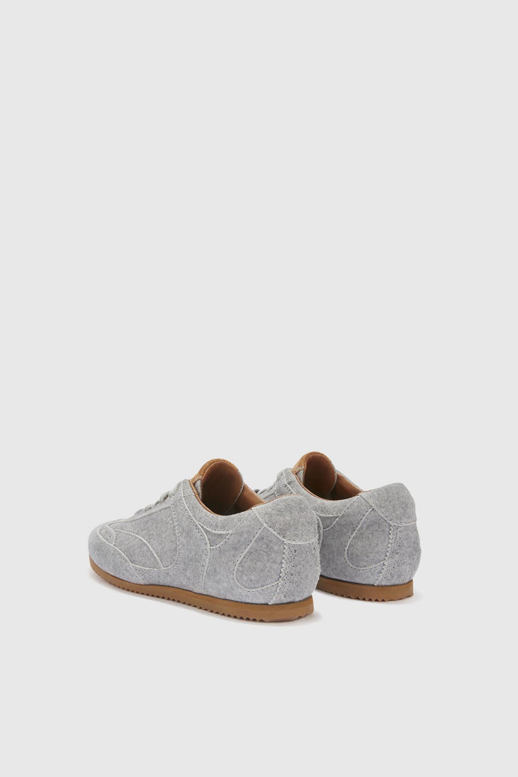 The new Winner sneaker in split leather with cloth effect print and amber rubber sole