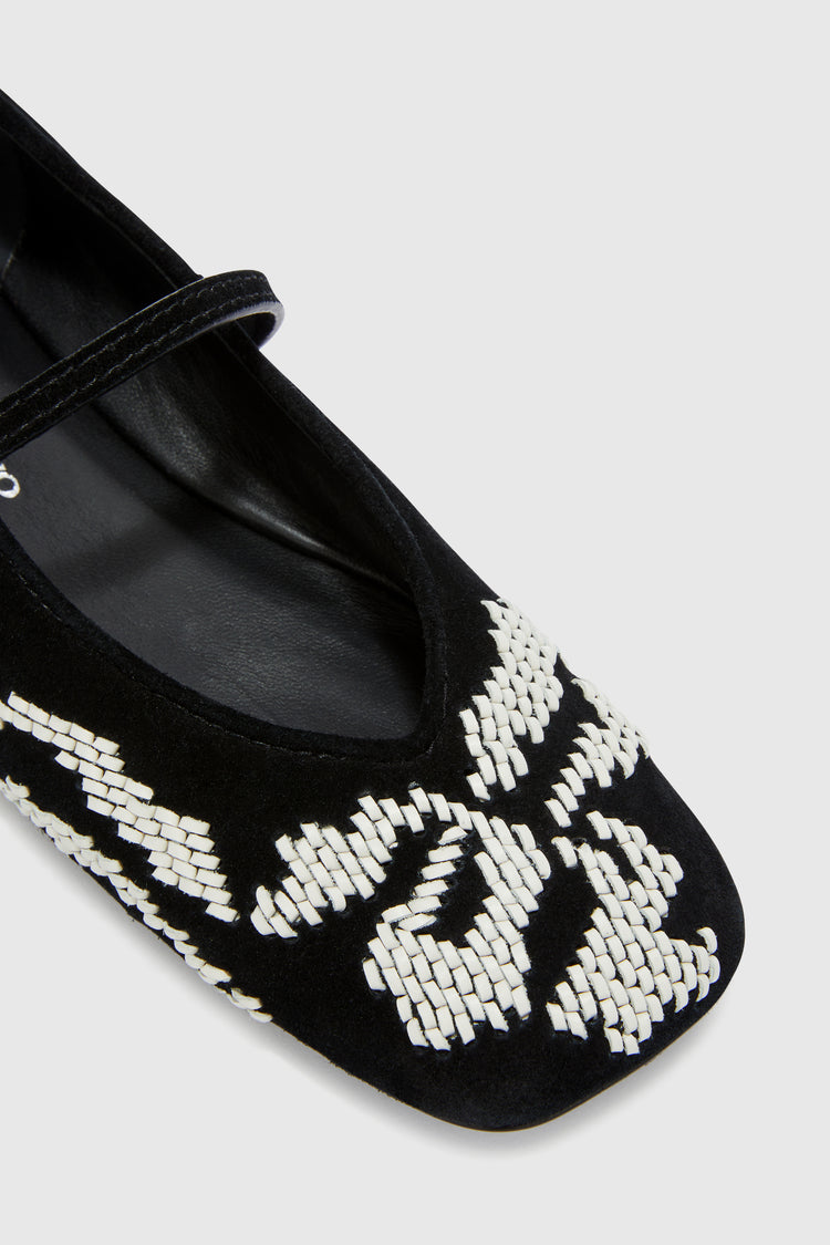 Suede ballerina with hand-embroidered leather ribbon detail
