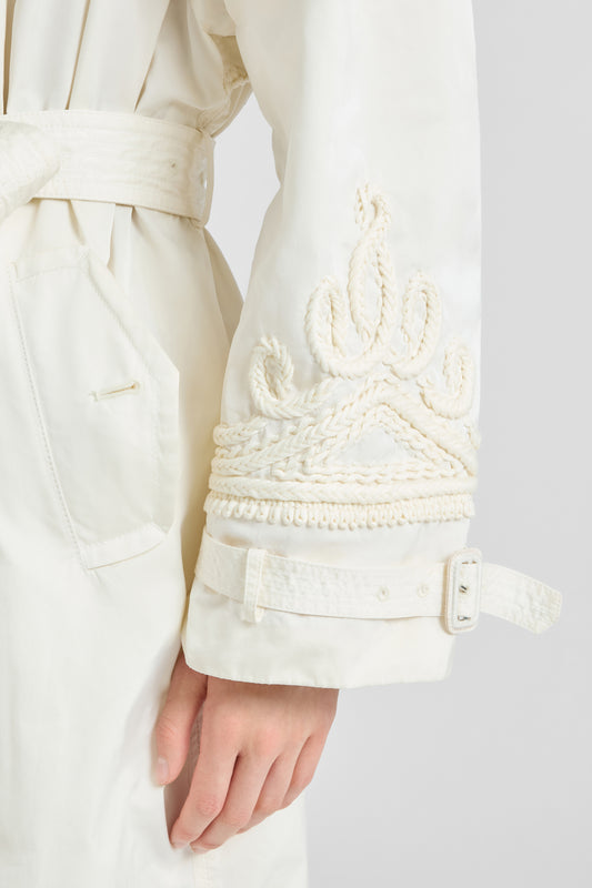 Double-breasted technical trench with hand-finished detailing