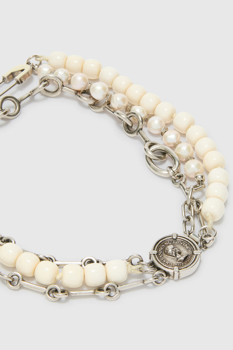 Multistrand necklace with pearls and coin clasp