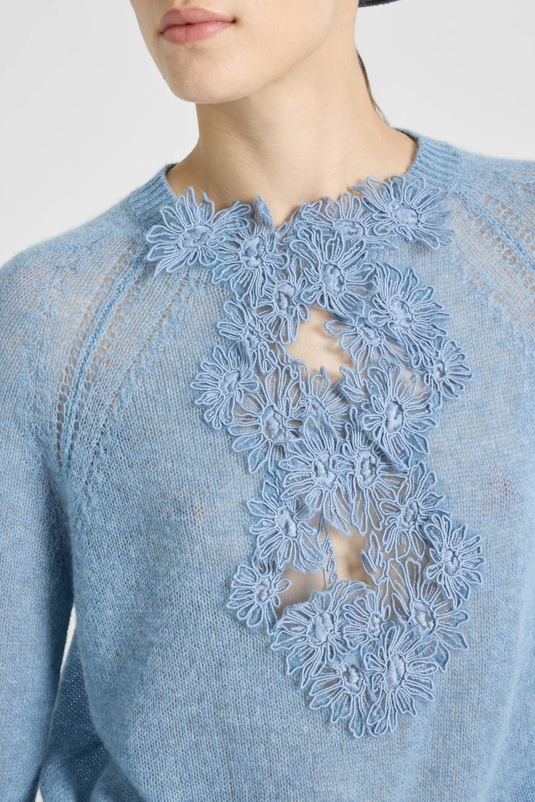 Cashmere sweater with V-neck and daisy appliqués