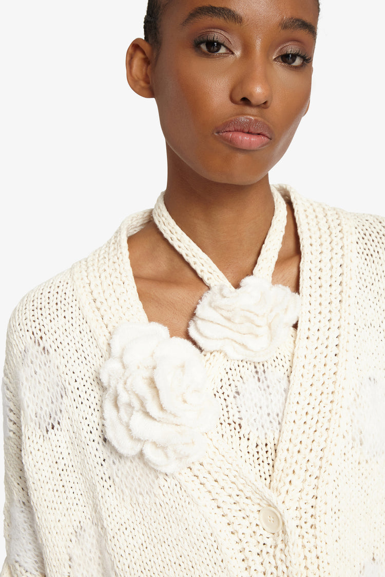 Cardigan in maglia con rosa