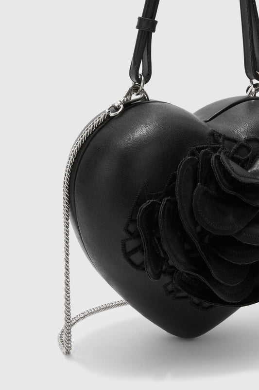 Heart-shaped clutch bag with rose