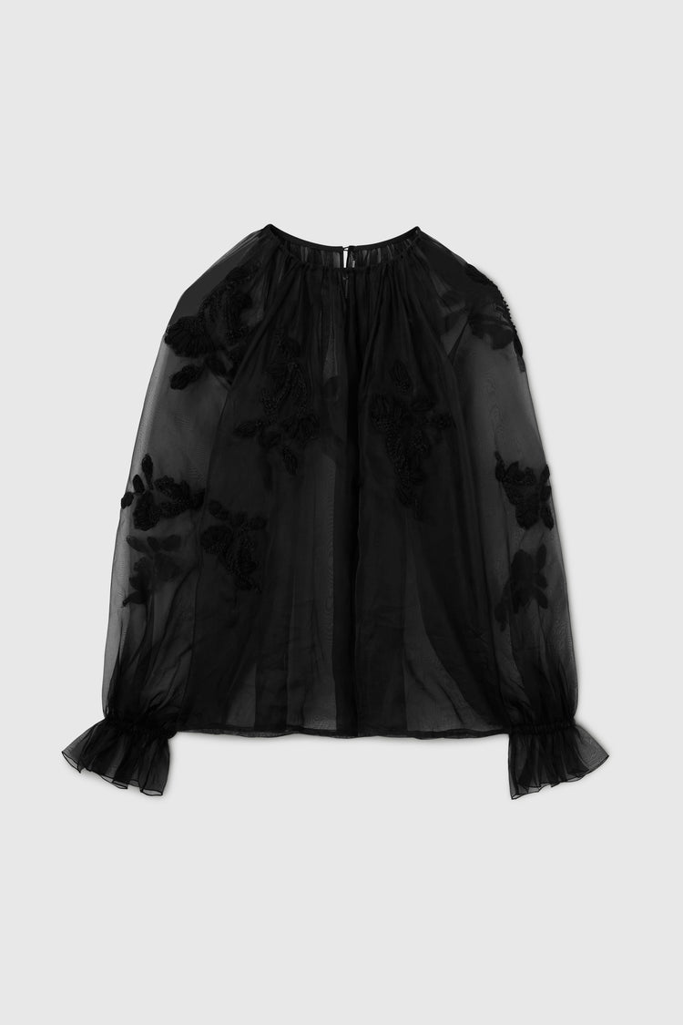 Blusa in organza con applicazioni pizzo