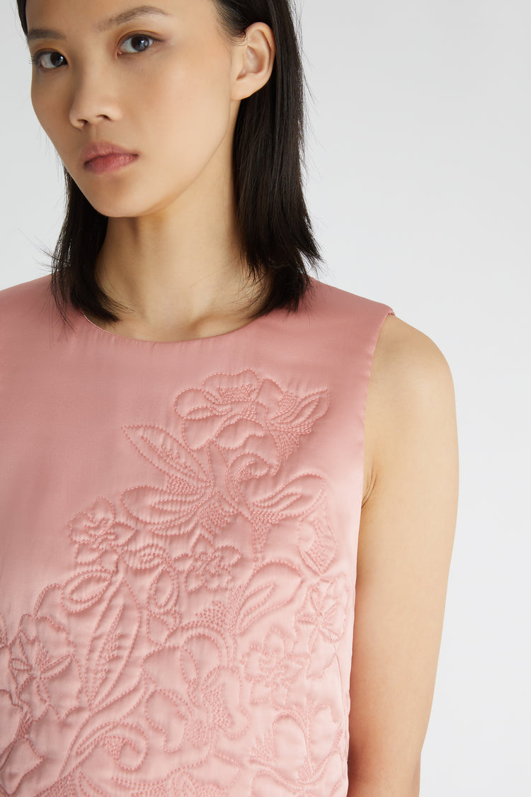 Satin top with quilted floral embroidery