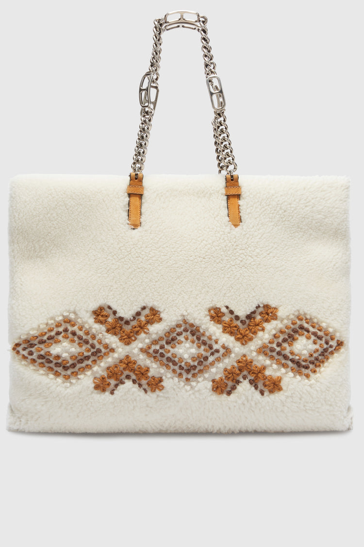 Pillow Bag in shearling con ricami fatti a mano