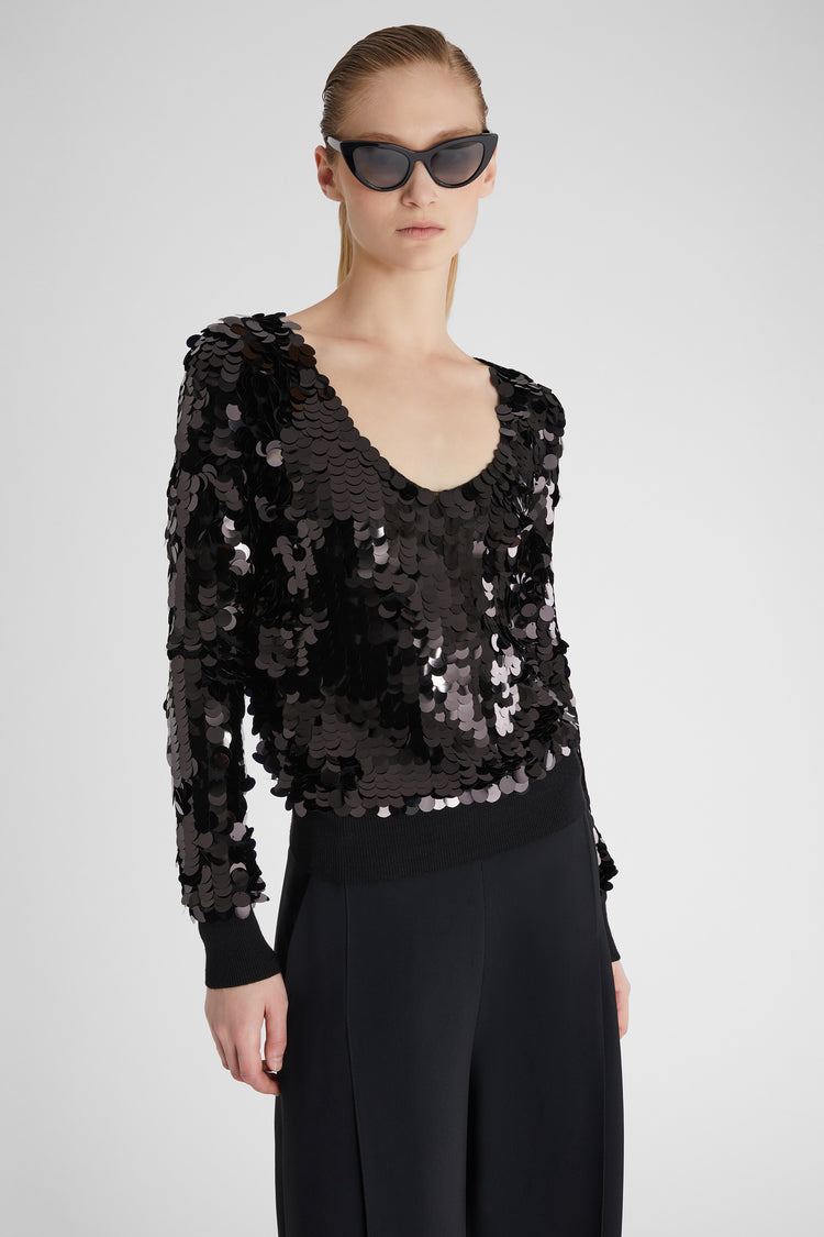 Maglia in pura lana merino con scollo a V e paillettes all over