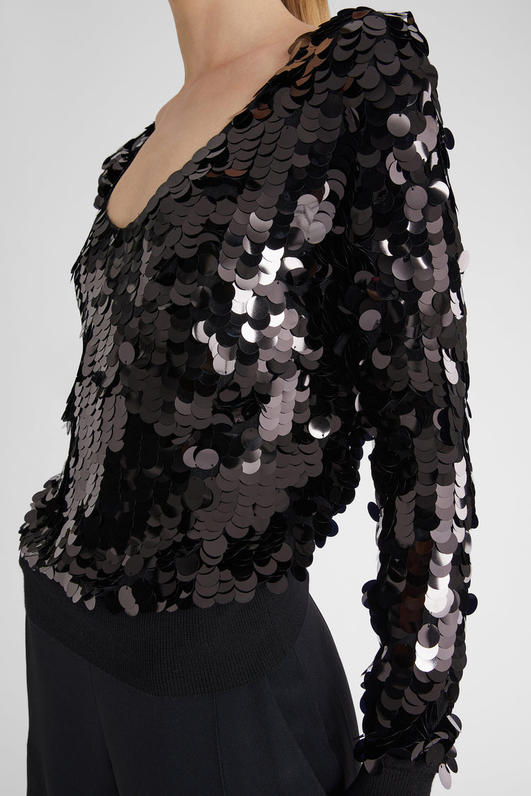 Maglia in pura lana merino con scollo a V e paillettes all over