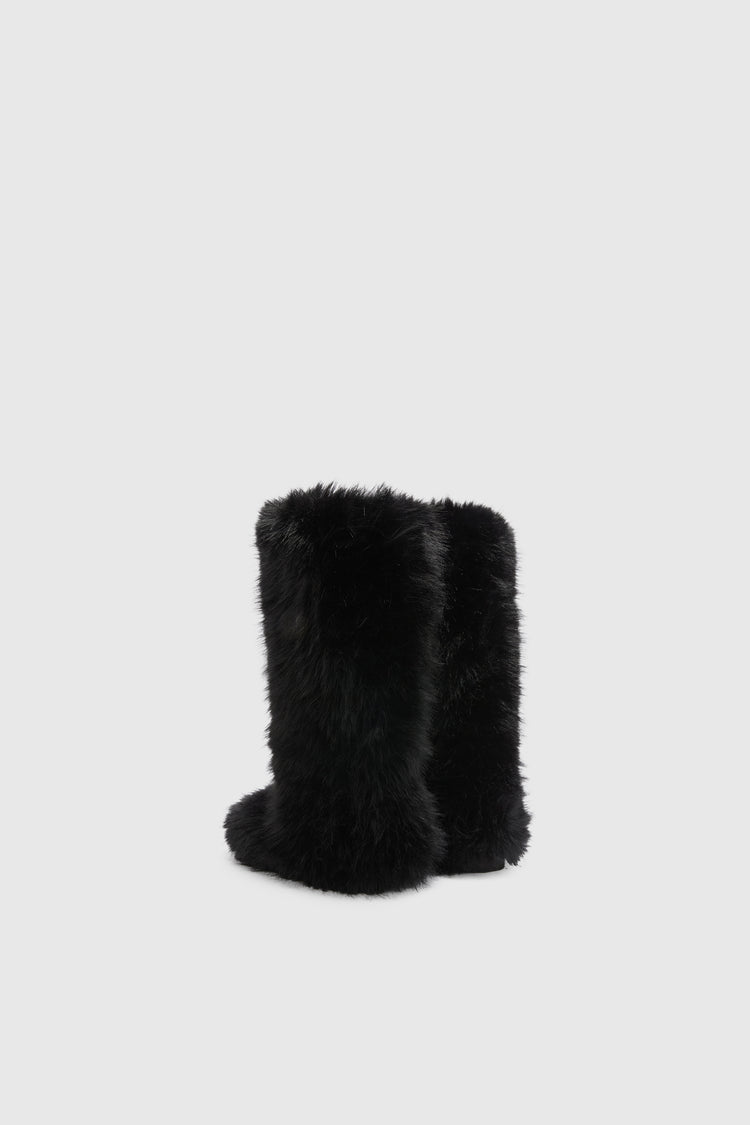 Faux-fur boot with handmade applications