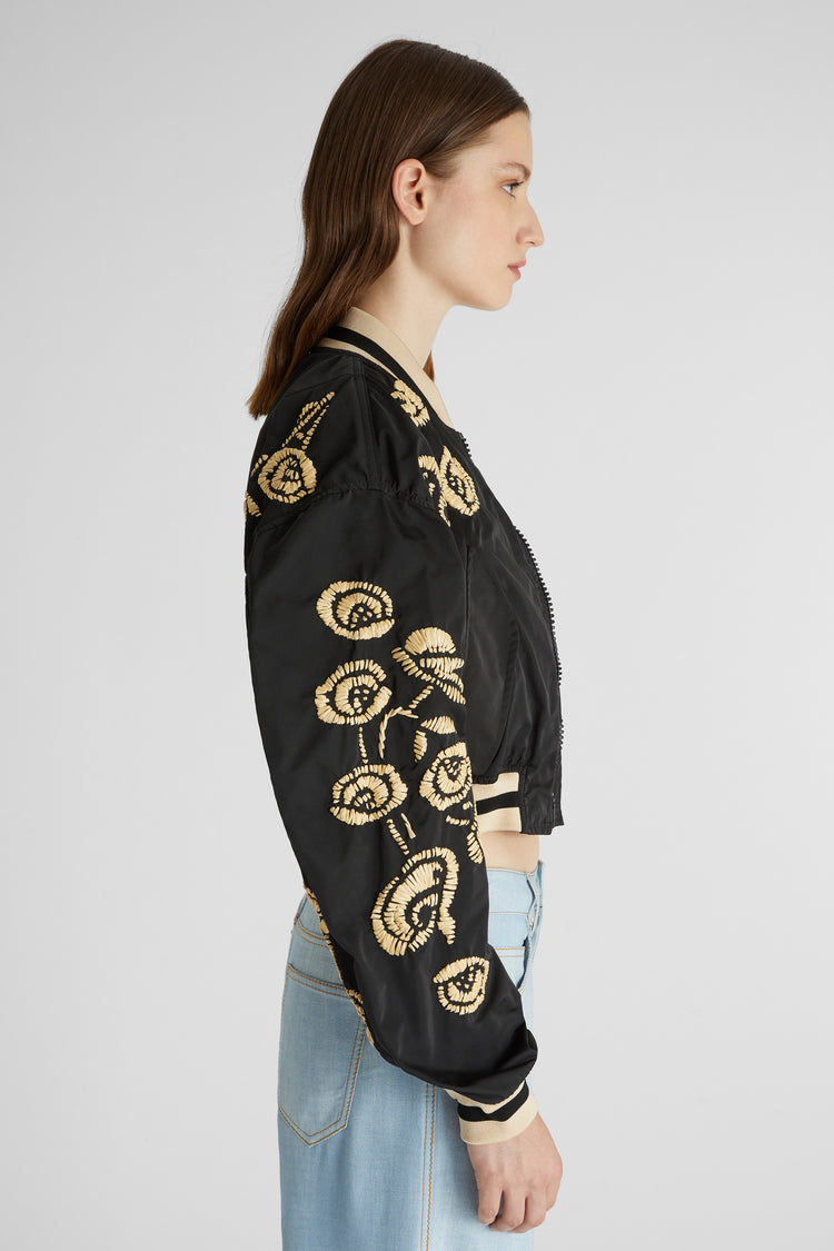 Technical fabric bomber jacket with handmade rafia floral embroidery