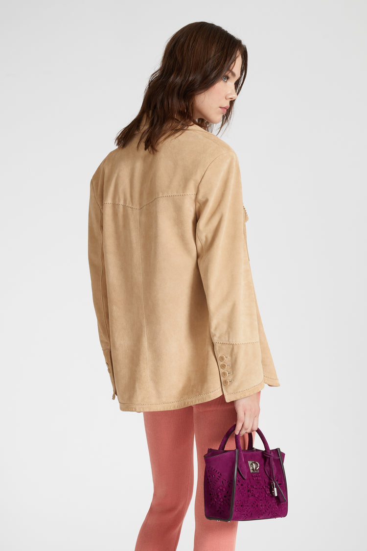 Single-breasted jacket in clouded suede with topstitching and broguing details.