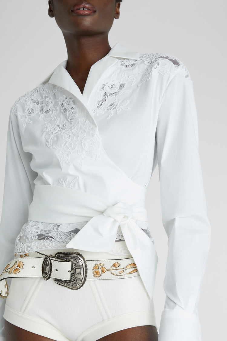 Crossed poplin shirt with bow and lace details