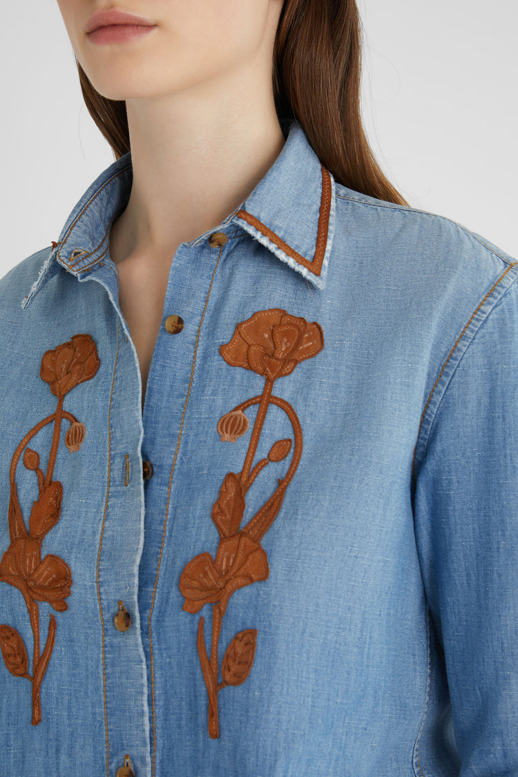 Denim shirt with handmade suede floral appliqué