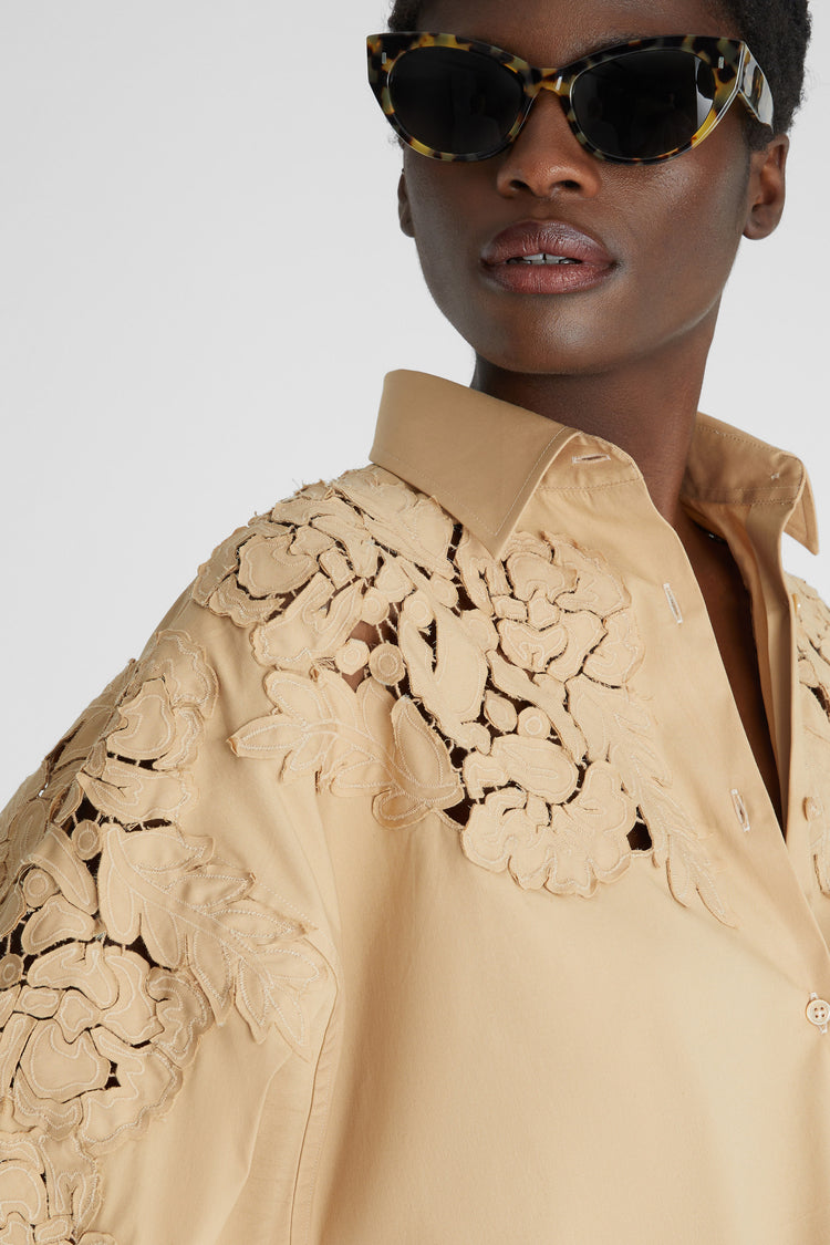 Oversize poplin shirt with handmade floral appliqués