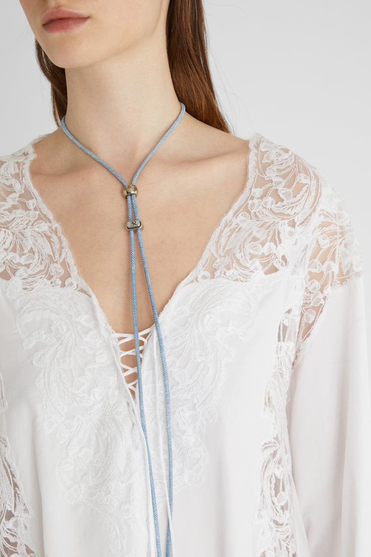 Short cotton kaftan with handmade rebrodé lace appliqués