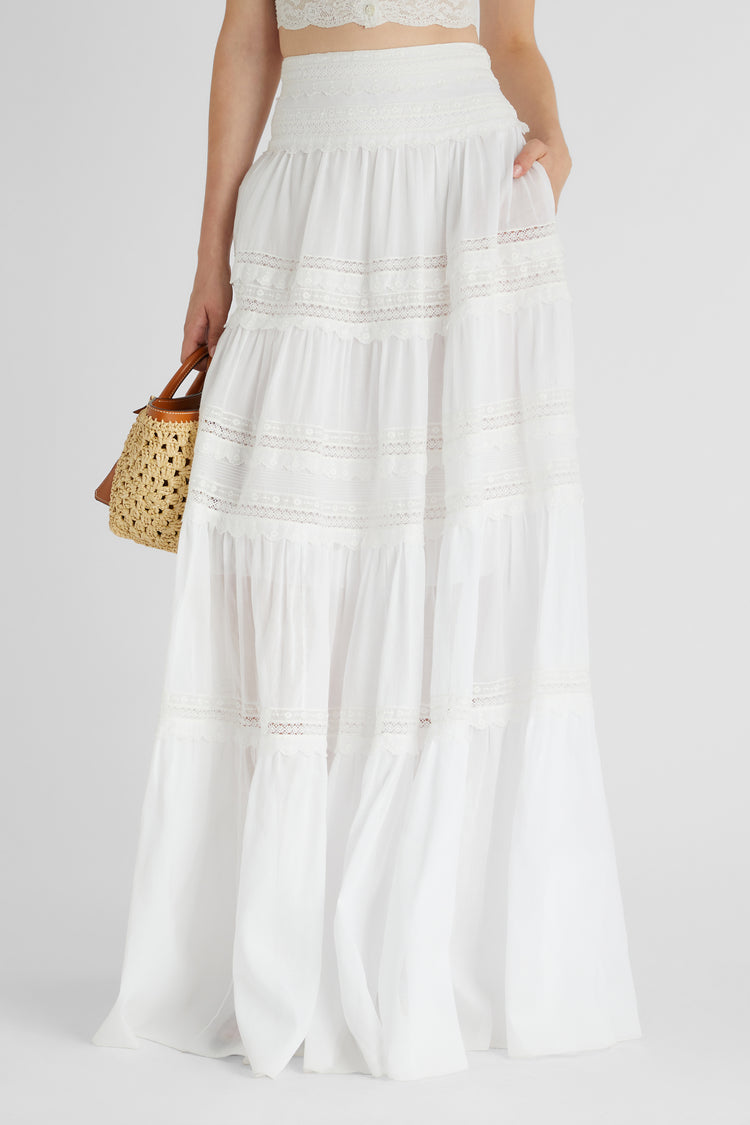 Long skirt in cotton muslin with flounces and valencienne lace appliqués, jour and scallop embroidery