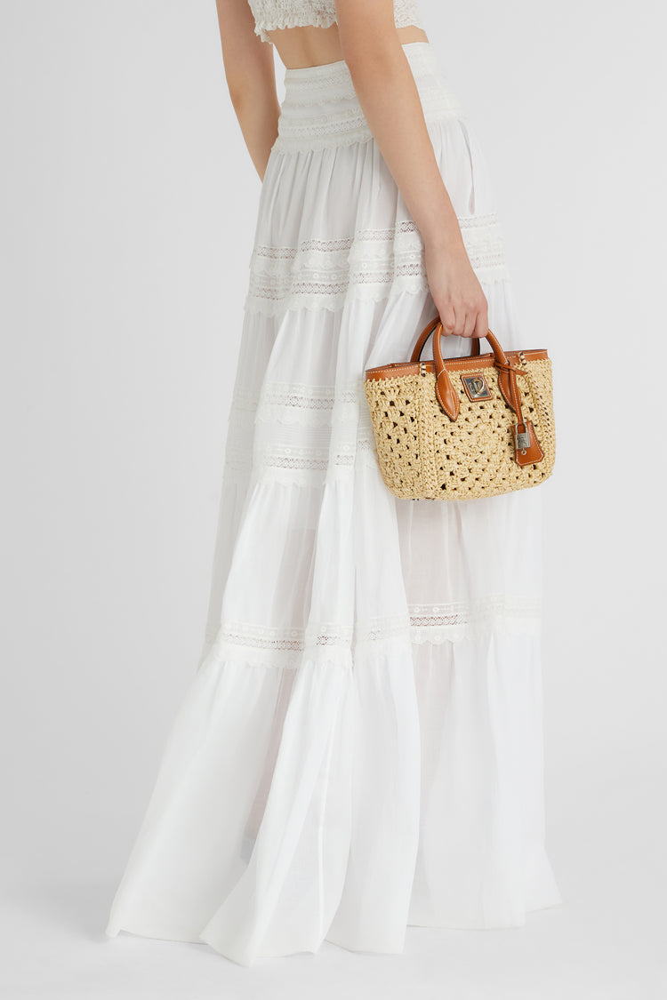 Long skirt in cotton muslin with flounces and valencienne lace appliqués, jour and scallop embroidery