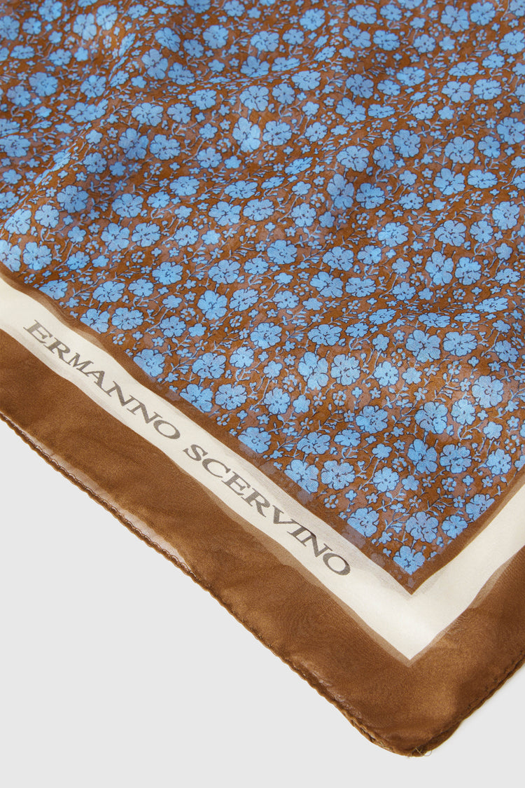 Pure silk scarf with a micro blue flower print on a brown background