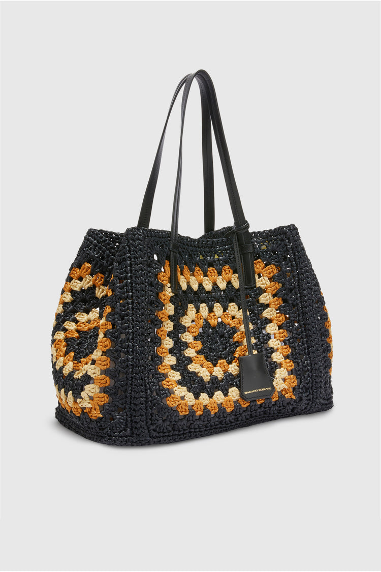 Shopping bag in natural rafia with hand-made crochet weave