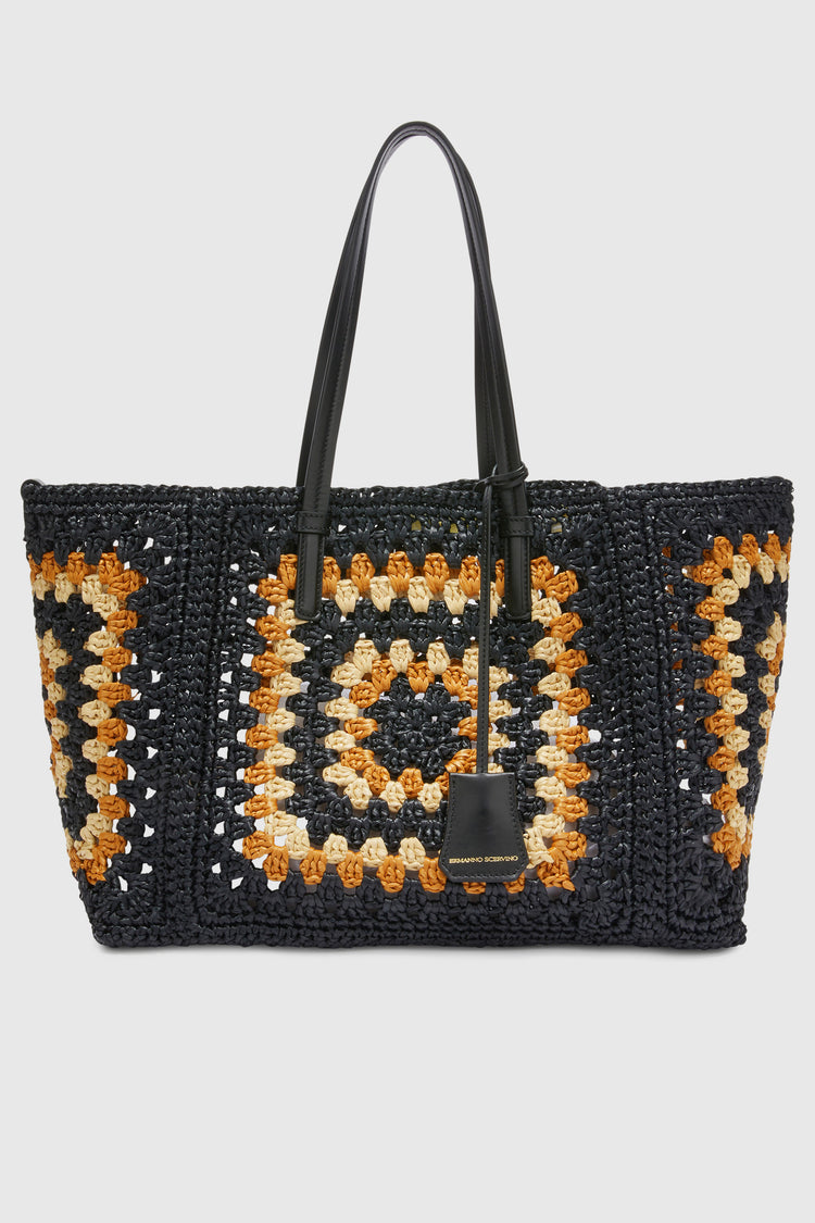 Shopping bag in natural rafia with hand-made crochet weave