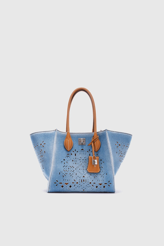 Medium Maggie in denim with handmade and hand-finished geometric cut-out